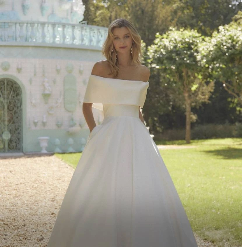 Photo of Model wearing a Alan Hannah Collection White Gown