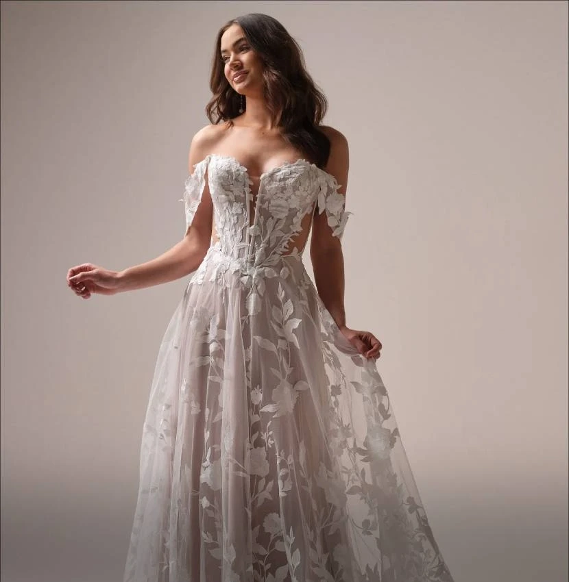 Photo of Model wearing a Maggie Sottero Collection White Gown