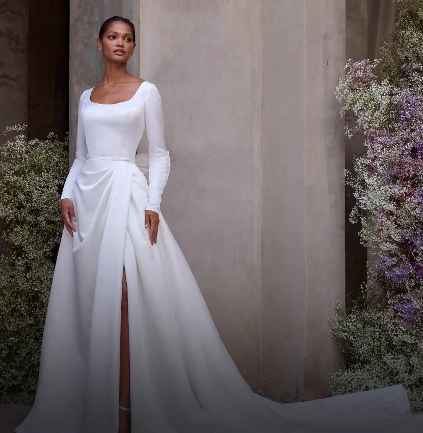 Photo of Model wearing a Morilee Collection White Gown