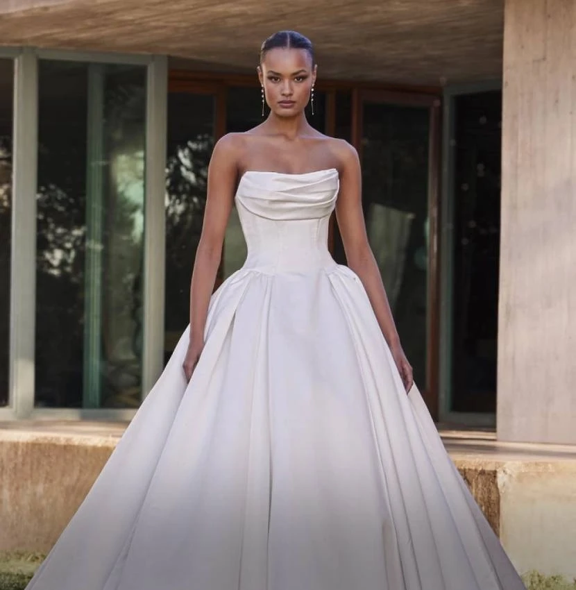 Photo of Model wearing a Pronovias Collection White Gown